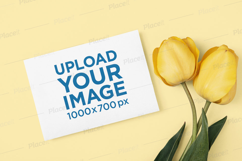 Mockup of a Horizontal Flyer Placed Next to Some Tulips