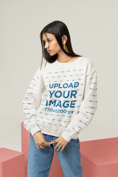 Mockup of a Young Woman Wearing a Sweatshirt With Customizable Sleeves