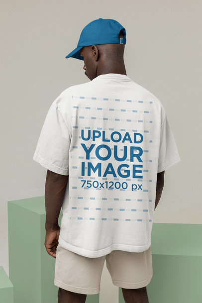 Back View Mockup of a Man Wearing an Oversized Tee