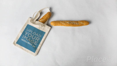 Baguettes Going In and Out of a Tote Bag in Stop Motion While Lying on a White Surface a13712