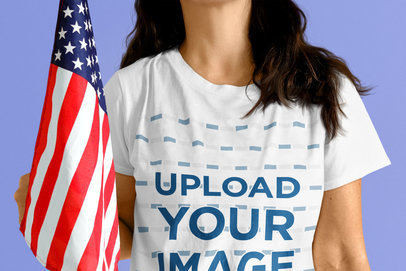 T-Shirt Mockup of a Woman Holding an American Flag