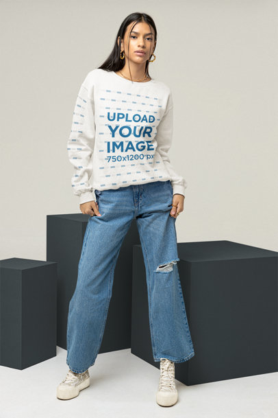 Sweatshirt Mockup of a Woman Wearing Ripped Jeans