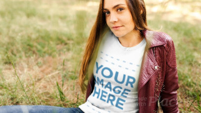 Young Woman Lying in a Field Wearing a T-Shirt Stop Motion