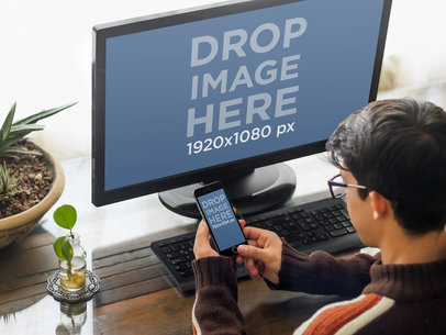 Teenager Looks at iPhone 6 Mockup and Desktop PC Mockup