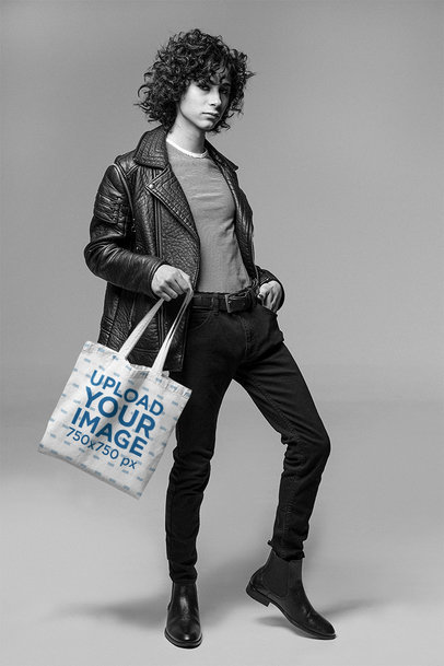 Tote Bag Mockup of a Man Posing Stylishly at a Studio 26380