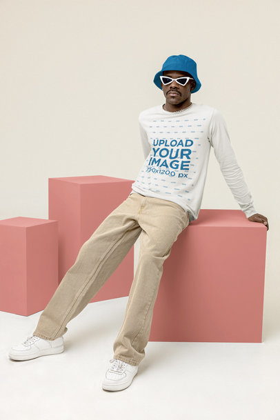 Long-Sleeve Tee Mockup Featuring a Man Wearing a Beanie and Sunglasses
