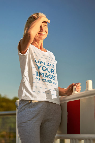 T-Shirt Mockup Featuring a Smiling Woman Watching a Sunset m11675-r-el2