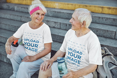 T-Shirt Mockup Featuring a Happy Elderly Couple Drinking Water After a Workout