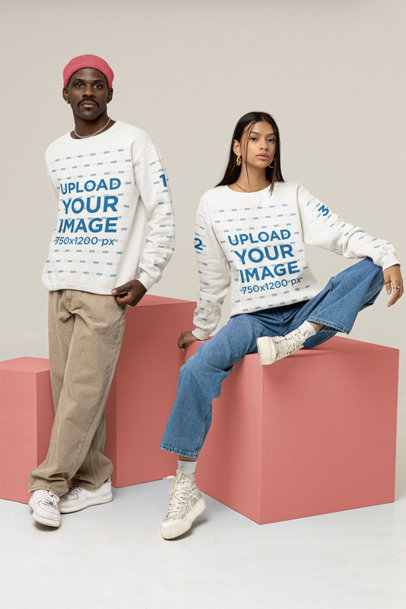 Mockup of a Man and a Woman Wearing Loose Sweatshirts