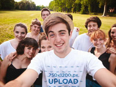 T-Shirt Mockup of a Happy Man Taking a Selfie With a Big Group of Friends