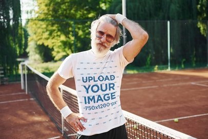 T-Shirt Mockup Featuring a Man with Sunglasses at a Tennis Court