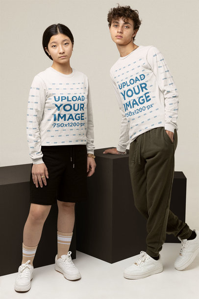 Long Sleeve Tee Mockup Featuring a Teenager and a Man at a Studio
