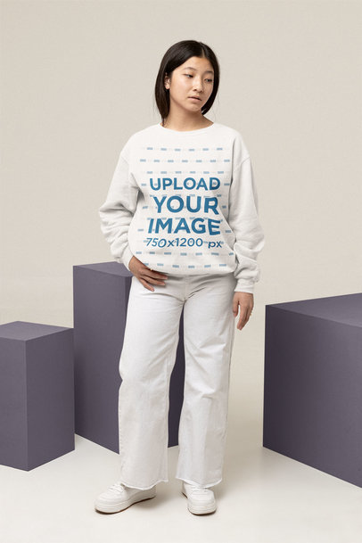 Sweatshirt Mockup of a Teenager Looking Sideways at a Studio