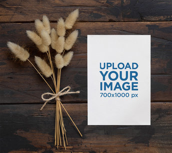 Wedding Program Mockup Featuring a Wooden Table and Dried Flowers m25014 r-el2