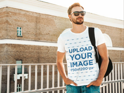 Round-Neck Tee Mockup of a Man with Sunglasses and a Backpack