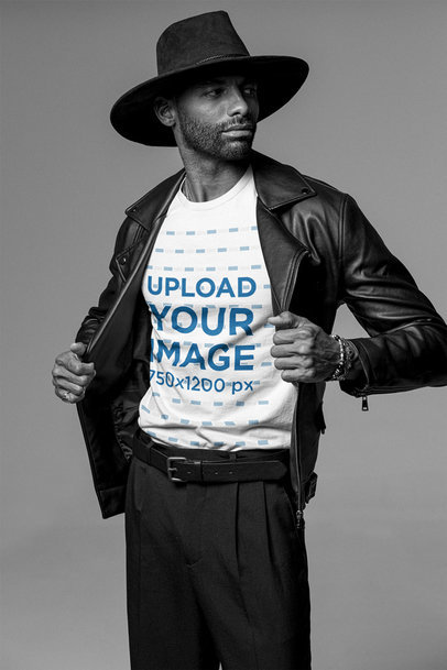 Bella Canvas Tee Mockup of a Man Looking Sideways While Wearing a Black Outfit m26423