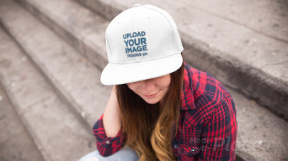 Stop Motion Of A Young White Woman Wearing A Hat While Sitting Down In Concrete Stairways Mockup 13703v