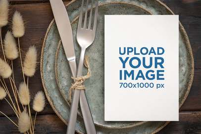 Mockup of a Wedding Program Lying on a Plate Featuring Dried Plants m25125 r-el2