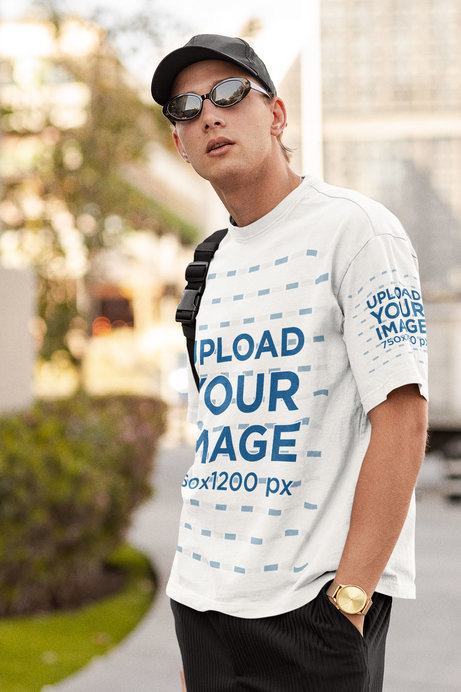 Mockup of a Man With Retro Sunglasses Wearing a T-Shirt