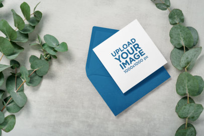 Square Wedding Program Featuring Some Plants Around It