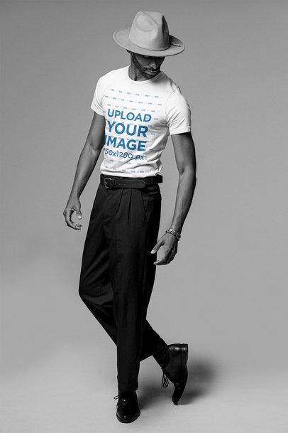 T-Shirt Mockup Featuring a Tall Bearded Man Posing 