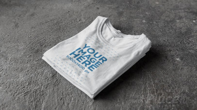 Round Neck T-Shirts Stacking on a Concrete Floor in Stop Motion a13148