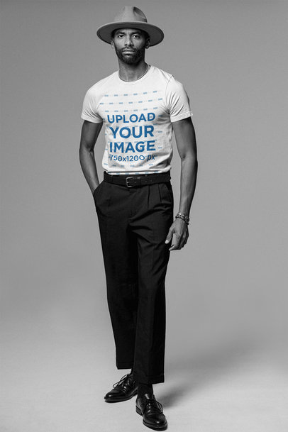 T-Shirt Mockup of a Tall Trendy Man Posing 