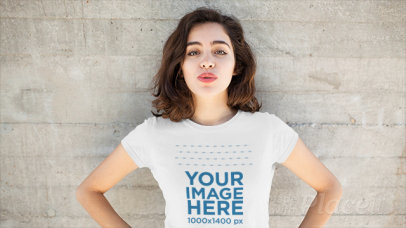 Beautiful Young Woman Doing Funny Faces Wearing T-Shirt Against Concrete Wall Stop Motion