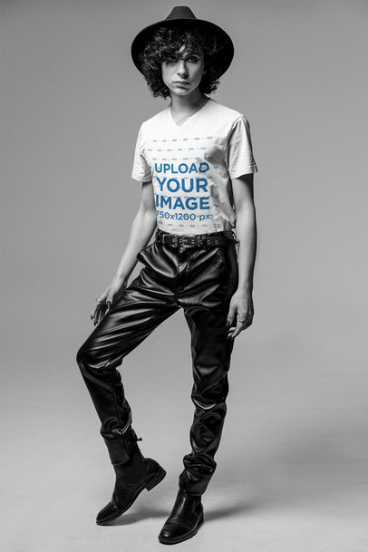 Black and White Mockup of a Man Posing While Wearing a V-Neck Tee