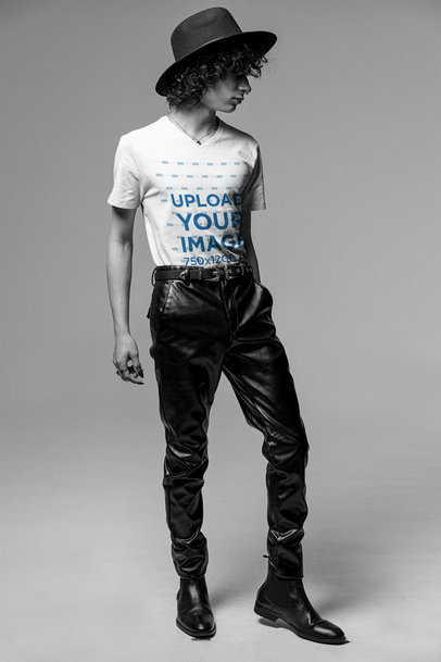 Mockup of a Trendy Man With a V-Neck Tee Posing in a Studio