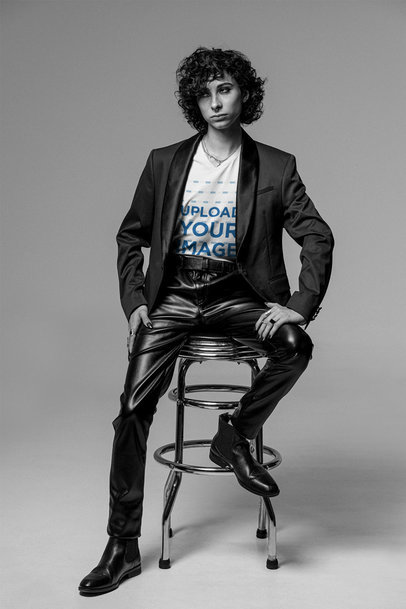 V-Neck Tee Mockup of a Curly-Haired Man Wearing Leather Pants m26411