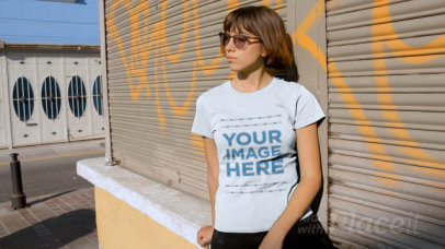 Short-Haired Woman Wearing a Tshirt Video Around a School Bus