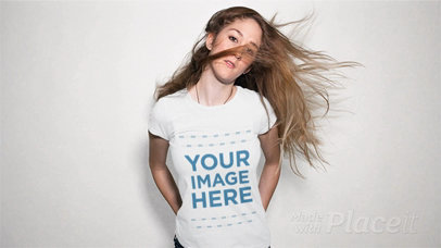 Lovely Young Woman Playing with her Hair Wearing a T-Shirt in Stop Motion