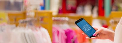 iPhone 6 in Portrait Position Mockup of a Woman Shopping for Clothes 