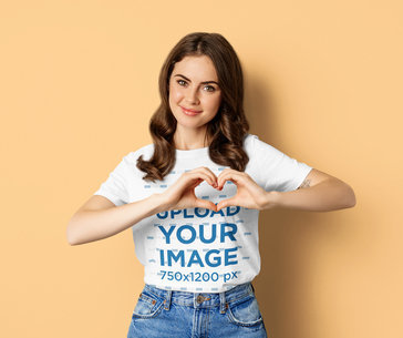 T-Shirt Mockup of a Young Woman Making a Heart Sign With Her Hands