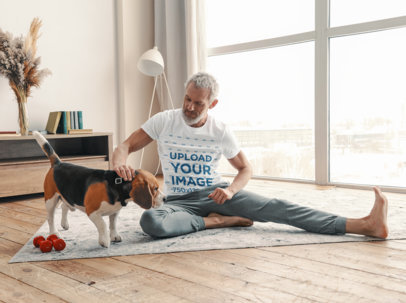 T-Shirt Mockup Featuring a Man Petting His Dog