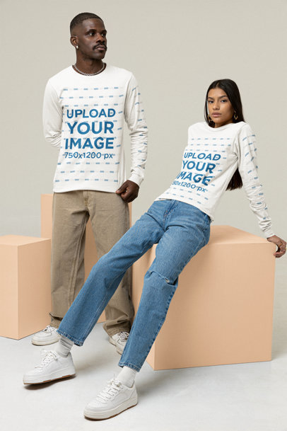 Long-Sleeve Tee Mockup Featuring a Couple Posing at a Studio