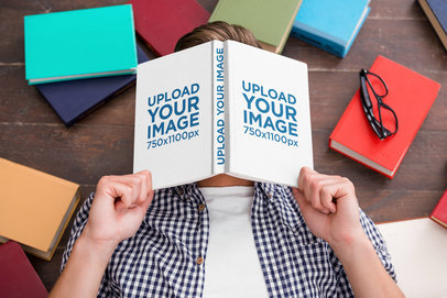 Mockup of a Man Hiding His Face Behind a Book m27905 r-el2