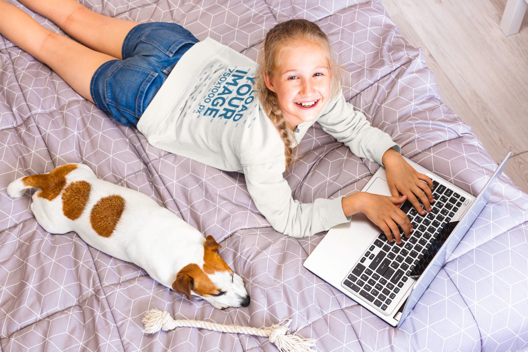 Sweatshirt Mockup of a Happy Girl With Her Dog Working on Her Laptop
