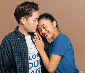 T-Shirt Mockup Featuring Two Women Hugging at a Studio