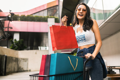 Tank Top Mockup of a Happy Woman with Shopping Bags