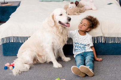 T-Shirt Mockup Featuring a Little Girl Petting Her Dog