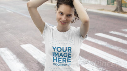 Pretty Young Woman Wearing a T-Shirt Stop Motion at the Street