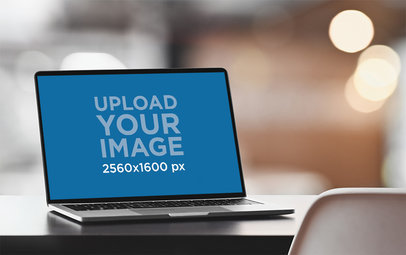 Mockup of a MacBook on an Office Desk