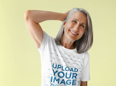 Round-Neck T-Shirt Mockup Featuring a Senior Woman Posing With a Big Smile