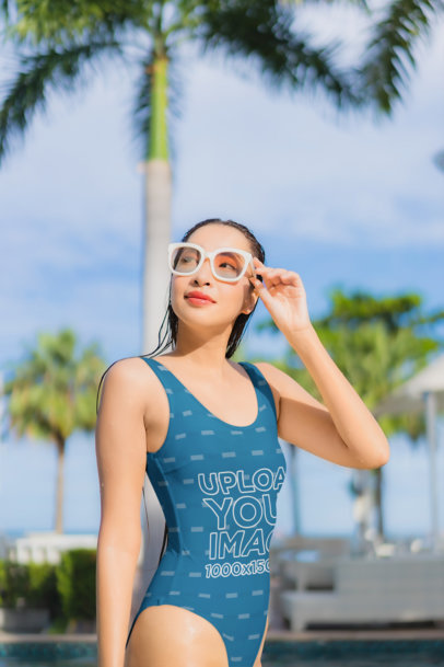 Raglan Swimsuit Mockup Featuring a Woman Enjoying the Sun