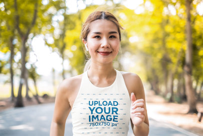 Mockup of a Happy Woman Running With a Cropped Tank Top