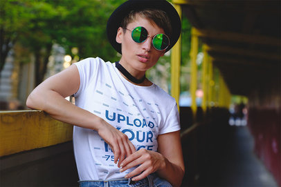 T-Shirt Mockup of a Woman Wearing Reflective Sunglasses