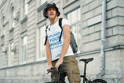 Round-Neck Tee Mockup of a Man Riding His Bike