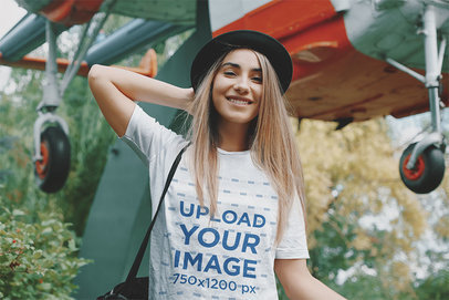 T-Shirt Mockup of a Smiling Woman Featuring a Helicopter Behind Her m4002 r-el2